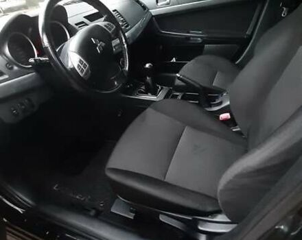 Черный Мицубиси Лансер, объемом двигателя 2 л и пробегом 63 тыс. км за 8000 $, фото 7 на Automoto.ua