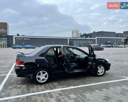 Чорний Міцубісі Lancer, об'ємом двигуна 1.6 л та пробігом 300 тис. км за 5500 $, фото 7 на Automoto.ua