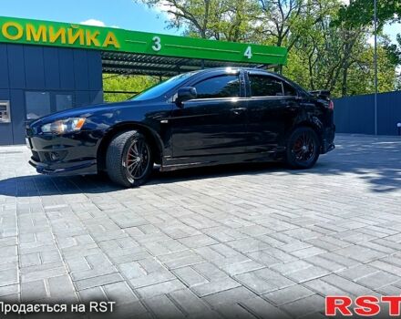 Мицубиси Лансер 2008 в Новомосковске на Automoto.ua Черный Мицубиси Лансер, объемом двигателя 1.5 л и пробегом 200 тыс. км за 6000 $, фото 5 на Automoto.ua