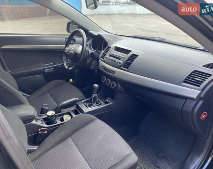 Черный Мицубиси Лансер, объемом двигателя 2 л и пробегом 200 тыс. км за 5500 $, фото 5 на Automoto.ua