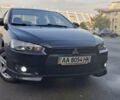 Чорний Міцубісі Lancer, об'ємом двигуна 2 л та пробігом 235 тис. км за 6500 $, фото 1 на Automoto.ua