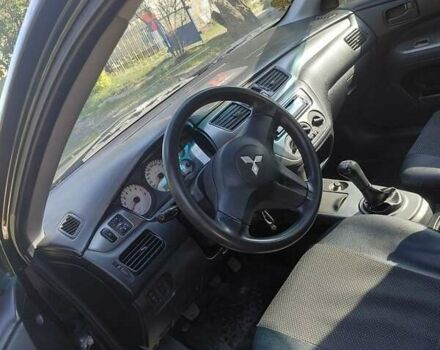 Чорний Міцубісі Lancer, об'ємом двигуна 1.6 л та пробігом 221 тис. км за 5200 $, фото 2 на Automoto.ua