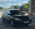 Черный Мицубиси Лансер, объемом двигателя 1.58 л и пробегом 250 тыс. км за 2900 $, фото 1 на Automoto.ua