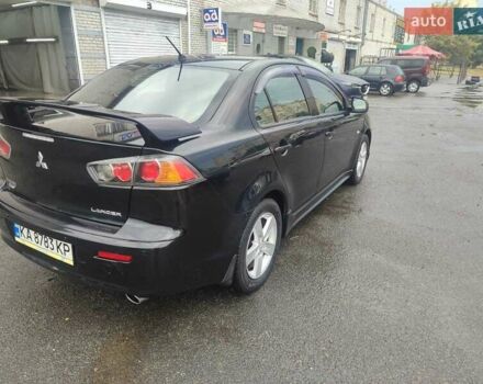 Черный Мицубиси Лансер, объемом двигателя 2 л и пробегом 229 тыс. км за 7300 $, фото 2 на Automoto.ua