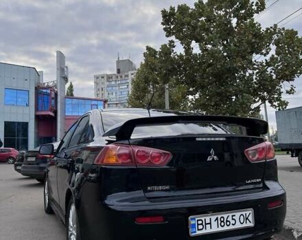 Черный Мицубиси Лансер, объемом двигателя 2 л и пробегом 222 тыс. км за 6000 $, фото 8 на Automoto.ua