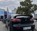 Черный Мицубиси Лансер, объемом двигателя 2 л и пробегом 222 тыс. км за 6000 $, фото 8 на Automoto.ua