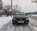 Чорний Міцубісі Lancer, об'ємом двигуна 1.6 л та пробігом 260 тис. км за 5500 $, фото 5 на Automoto.ua