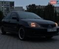 Чорний Міцубісі Lancer, об'ємом двигуна 1.58 л та пробігом 255 тис. км за 3600 $, фото 1 на Automoto.ua