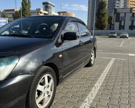 Чорний Міцубісі Lancer, об'ємом двигуна 1.6 л та пробігом 364 тис. км за 3000 $, фото 4 на Automoto.ua