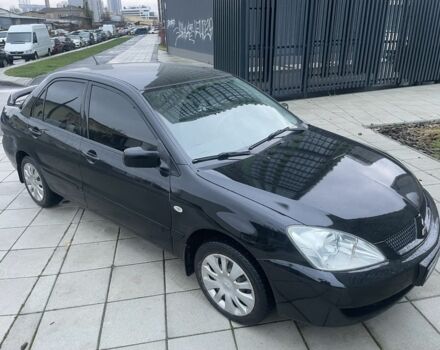 Черный Мицубиси Лансер, объемом двигателя 1.6 л и пробегом 226 тыс. км за 3750 $, фото 6 на Automoto.ua