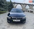 Чорний Міцубісі Lancer, об'ємом двигуна 1.5 л та пробігом 184 тис. км за 6000 $, фото 1 на Automoto.ua