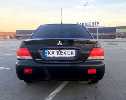 Чорний Міцубісі Lancer, об'ємом двигуна 1.6 л та пробігом 375 тис. км за 4899 $, фото 4 на Automoto.ua