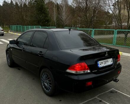 Чорний Міцубісі Lancer, об'ємом двигуна 1.6 л та пробігом 380 тис. км за 4350 $, фото 5 на Automoto.ua