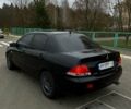 Чорний Міцубісі Lancer, об'ємом двигуна 1.6 л та пробігом 380 тис. км за 4350 $, фото 5 на Automoto.ua