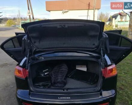 Мицубиси Лансер 2008 в Киеве на Automoto.ua Черный Мицубиси Лансер, объемом двигателя 2 л и пробегом 196 тыс. км за 5500 $, фото 28 на Automoto.ua