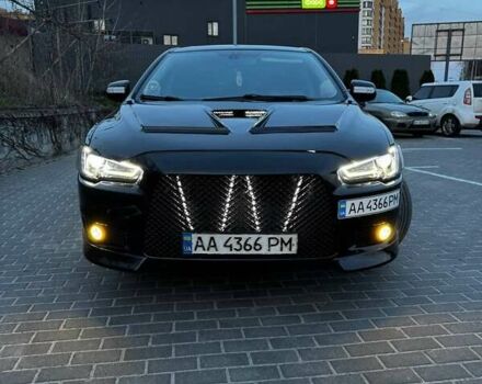 Черный Мицубиси Лансер, объемом двигателя 2 л и пробегом 240 тыс. км за 10000 $, фото 10 на Automoto.ua