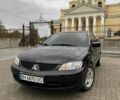 Черный Мицубиси Лансер, объемом двигателя 1.58 л и пробегом 133 тыс. км за 5200 $, фото 1 на Automoto.ua