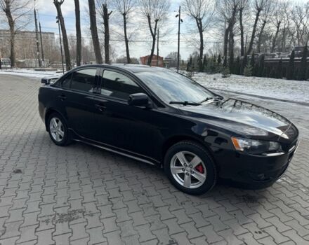 Чорний Міцубісі Lancer, об'ємом двигуна 2 л та пробігом 237 тис. км за 7500 $, фото 1 на Automoto.ua