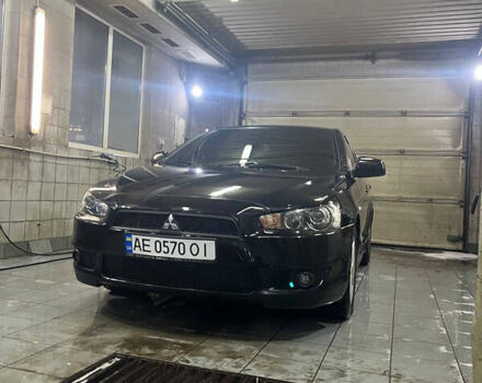 Черный Мицубиси Лансер, объемом двигателя 2 л и пробегом 200 тыс. км за 8000 $, фото 2 на Automoto.ua