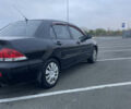 Міцубісі Lancer 2008 у Києві на Automoto.ua Чорний Міцубісі Lancer, об'ємом двигуна 1.58 л та пробігом 300 тис. км за 3800 $, фото 2 на Automoto.ua