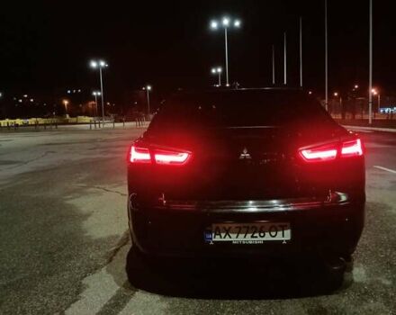 Черный Мицубиси Лансер, объемом двигателя 2 л и пробегом 240 тыс. км за 6400 $, фото 17 на Automoto.ua