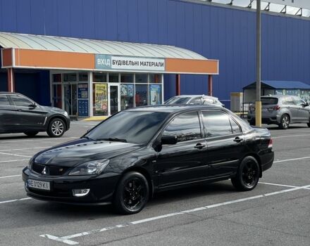 Чорний Міцубісі Lancer, об'ємом двигуна 1.6 л та пробігом 188 тис. км за 2200 $, фото 1 на Automoto.ua