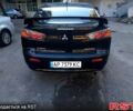 Чорний Міцубісі Lancer, об'ємом двигуна 2 л та пробігом 21 тис. км за 7300 $, фото 1 на Automoto.ua