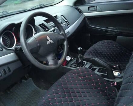 Черный Мицубиси Лансер, объемом двигателя 1.5 л и пробегом 177 тыс. км за 5100 $, фото 10 на Automoto.ua