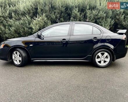 Чорний Міцубісі Lancer, об'ємом двигуна 2 л та пробігом 217 тис. км за 5600 $, фото 9 на Automoto.ua