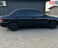Чорний Міцубісі Lancer, об'ємом двигуна 1.58 л та пробігом 237 тис. км за 4500 $, фото 9 на Automoto.ua