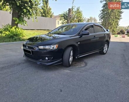 Черный Мицубиси Лансер, объемом двигателя 2 л и пробегом 230 тыс. км за 7000 $, фото 23 на Automoto.ua