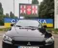 Черный Мицубиси Лансер, объемом двигателя 2 л и пробегом 250 тыс. км за 5300 $, фото 1 на Automoto.ua