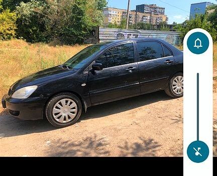 Чорний Міцубісі Lancer, об'ємом двигуна 1.6 л та пробігом 245 тис. км за 3200 $, фото 1 на Automoto.ua