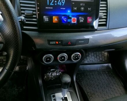 Черный Мицубиси Лансер, объемом двигателя 2 л и пробегом 196 тыс. км за 5500 $, фото 13 на Automoto.ua