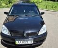 Чорний Міцубісі Lancer, об'ємом двигуна 1.6 л та пробігом 210 тис. км за 4800 $, фото 1 на Automoto.ua