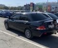 Черный Мицубиси Лансер, объемом двигателя 1.6 л и пробегом 206 тыс. км за 5800 $, фото 3 на Automoto.ua