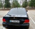 Мицубиси Лансер 2008 в Львове на Automoto.ua Черный Мицубиси Лансер, объемом двигателя 1.58 л и пробегом 200 тыс. км за 5200 $, фото 57 на Automoto.ua