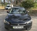 Черный Мицубиси Лансер, объемом двигателя 1.5 л и пробегом 286 тыс. км за 3819 $, фото 1 на Automoto.ua