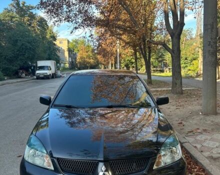 Міцубісі Lancer 2008 у Кривому Розі на Automoto.ua Чорний Міцубісі Lancer, об'ємом двигуна 1.6 л та пробігом 230 тис. км за 4380 $, фото 5 на Automoto.ua