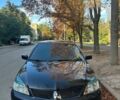 Міцубісі Lancer 2008 у Кривому Розі на Automoto.ua Чорний Міцубісі Lancer, об'ємом двигуна 1.6 л та пробігом 230 тис. км за 4380 $, фото 5 на Automoto.ua