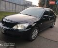 Черный Мицубиси Лансер, объемом двигателя 1.58 л и пробегом 217 тыс. км за 4900 $, фото 4 на Automoto.ua