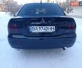Черный Мицубиси Лансер, объемом двигателя 1.58 л и пробегом 180 тыс. км за 5000 $, фото 5 на Automoto.ua
