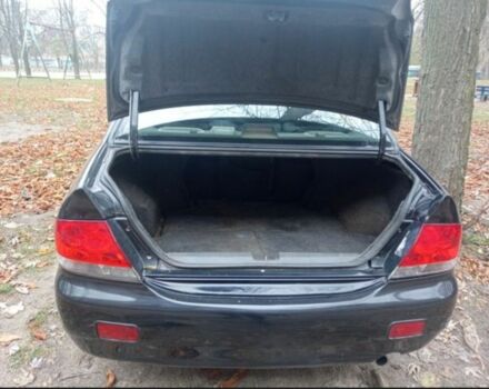 Черный Мицубиси Лансер, объемом двигателя 6 л и пробегом 190 тыс. км за 4500 $, фото 6 на Automoto.ua