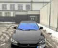 Черный Мицубиси Лансер, объемом двигателя 2 л и пробегом 1610 тыс. км за 7500 $, фото 1 на Automoto.ua