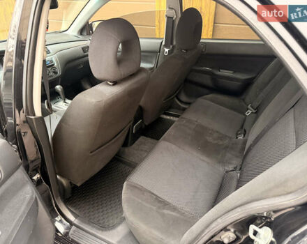 Чорний Міцубісі Lancer, об'ємом двигуна 1.6 л та пробігом 265 тис. км за 4700 $, фото 22 на Automoto.ua