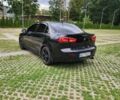Черный Мицубиси Лансер, объемом двигателя 2 л и пробегом 190 тыс. км за 6500 $, фото 1 на Automoto.ua