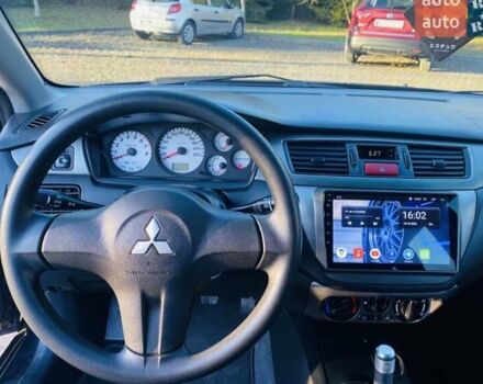 Мицубиси Лансер 2008 в Львове на Automoto.ua Черный Мицубиси Лансер, объемом двигателя 1.58 л и пробегом 200 тыс. км за 5200 $, фото 21 на Automoto.ua
