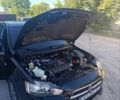 Чорний Міцубісі Lancer, об'ємом двигуна 2 л та пробігом 227 тис. км за 5500 $, фото 34 на Automoto.ua