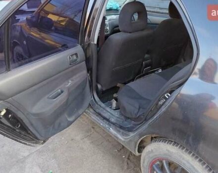 Черный Мицубиси Лансер, объемом двигателя 1.6 л и пробегом 200 тыс. км за 2000 $, фото 10 на Automoto.ua