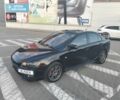 Черный Мицубиси Лансер, объемом двигателя 2 л и пробегом 248 тыс. км за 5500 $, фото 1 на Automoto.ua